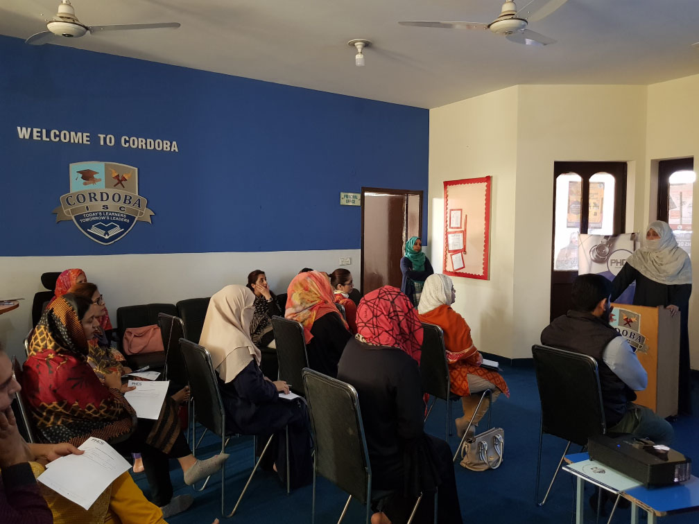 Participants attending a health education workshop at Cordoba
