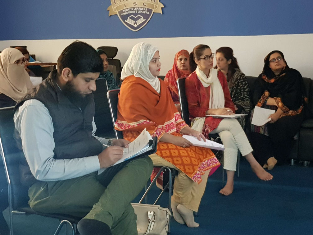 Workshop attendees reviewing session materials