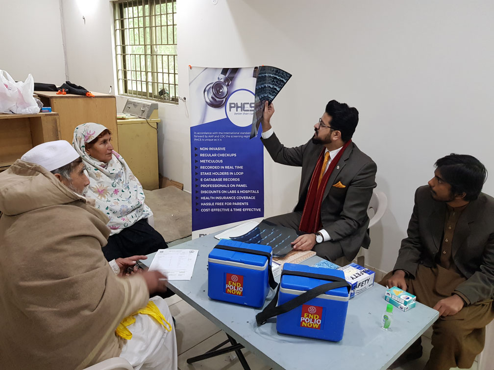 Clinician reviewing an image during a consultation